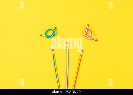 Colorful flex pencils on yellow background, increase creative potential for playful kids crafts Stock Photo