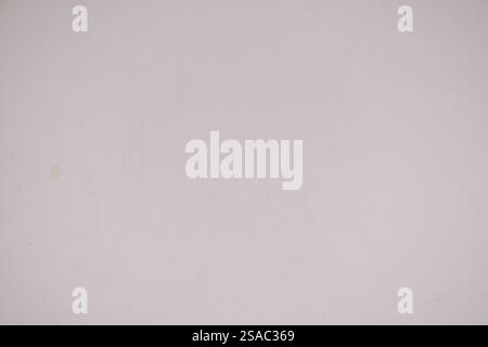 Clean, bright white wall background with subtle texture, perfect for minimalist designs. Stock Photo