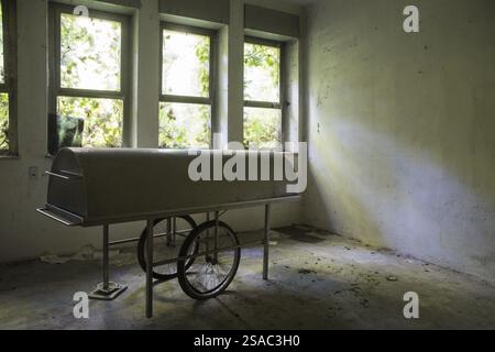 A picture of an abandoned visiting room in a psychiatric hospital in Vercelli, Italy, Europe Stock Photo