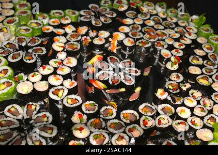 Sushi and maki platter in a restaurant. Japanese cuisine. Stock Photo