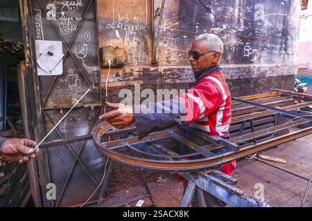 Welder at work in a workshop in Marrakesh, Morocco Stock Photo