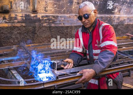 Welder at work in a workshop in Marrakesh, Morocco Stock Photo