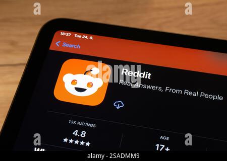OSTRAVA, CZECHIA - SEPTEMBER 24, 2024: App store with Reddit discussion mobile application on smartphone Stock Photo