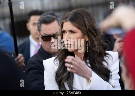 Secretary of Homeland Security Kristi Noem walks towards the West Wing ...