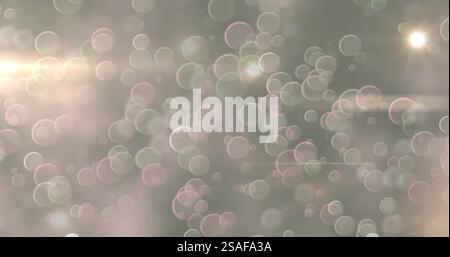 Soft bokeh lights image over blurred background with glowing circles Stock Photo