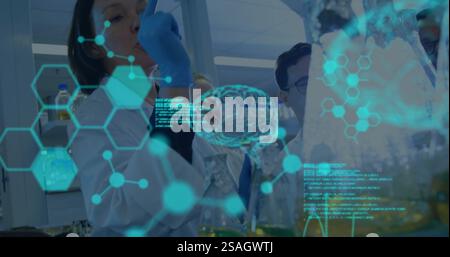 Image of scientific data processing over diverse scientists in laboratory Stock Photo