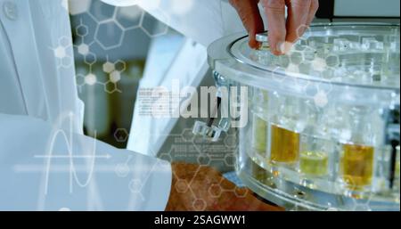 Image of data processing and chemical formula over caucasian scientist doing experiment in lab Stock Photo