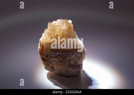 Quartz crystal isolated on white background, semi-precious stones or gemstone design elements, side view. For text. Horizontal Stock Photo