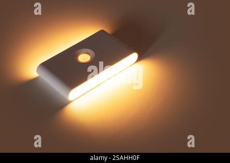 Small solar night led light with motion sensor Stock Photo