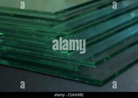 Glass factories produce glass used in buildings and homes. There are many different thicknesses and sizes. Stock Photo