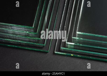 Glass factories produce glass used in buildings and homes. There are many different thicknesses and sizes. Stock Photo