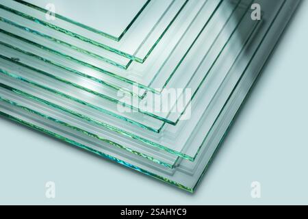 Glass factories produce glass used in buildings and homes. There are many different thicknesses and sizes. Stock Photo