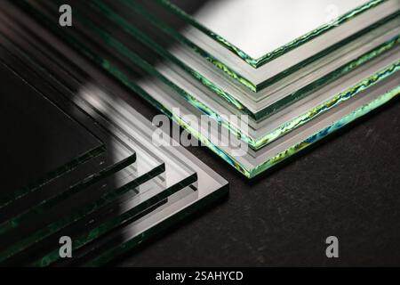Glass factories produce glass used in buildings and homes. There are many different thicknesses and sizes. Stock Photo