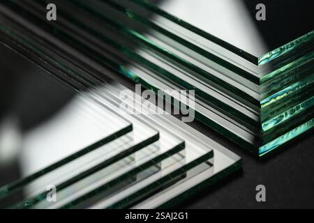 Glass factories produce glass used in buildings and homes. There are many different thicknesses and sizes. Stock Photo