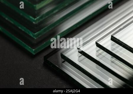 Glass factories produce glass used in buildings and homes. There are many different thicknesses and sizes. Stock Photo