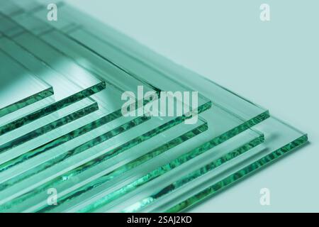 Glass factories produce glass used in buildings and homes. There are many different thicknesses and sizes. Stock Photo