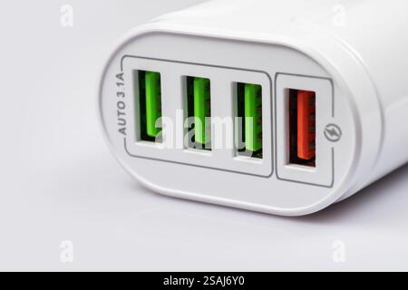 mobile phone charger on white background, studio shot. Stock Photo
