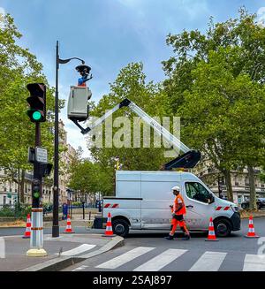 Paris, France, French City Workers Installing Surveillance Camera on Street Intersection, Security Video Surveillance, from truck paris street scene Stock Photo