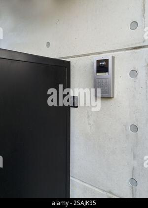 Modern Intercom System on Concrete Wall Stock Photo