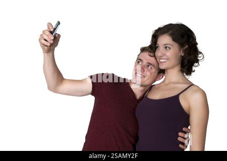 Couple taking a selfie with a cell phone Stock Photo