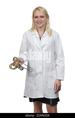 Beautiful young female doctor on her rounds Stock Photo