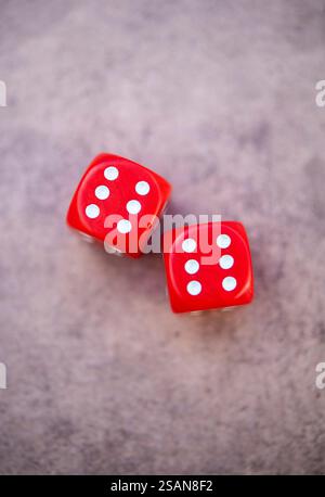 Still life of two six-sided dice showing a roll of double six Stock Photo