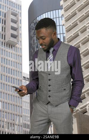 Young African American black man talking on a cell phone Stock Photo