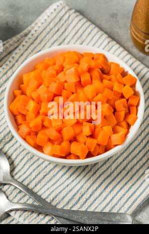 Healthy Organic Steamed Frozen Carrots Ready to Eat in a Bowl Stock Photo