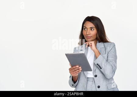 Busy African American business woman thinking on question using digital tablet. Stock Photo