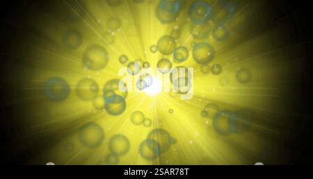 Image of bubbles and yellow lights on black background Stock Photo