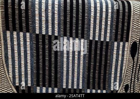 Close-up view of thick, black and white, striped fabric of sofa cover Stock Photo