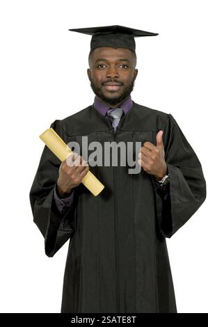 Young man in his graduation robes Stock Photo
