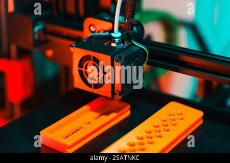3d printer arm header nozzle printed object isometric view colorful light red green contrast Stock Photo
