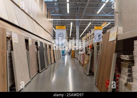 Grodno, Belarus - October 22, 2024: Variety of wooden flooring with different textures and colors in construction supermarket. This image capture an e Stock Photo