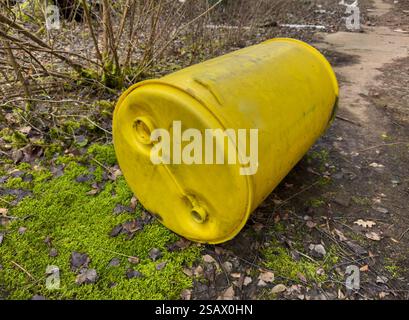 old yellow barrel of oil on the nature Stock Photo