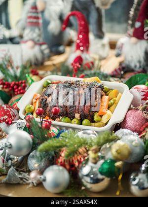 Christmas italian pork roast with vegetables Stock Photo