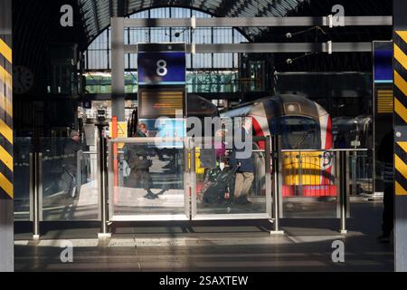 Rail passengers enter King's Cross mainline station, on 30th January ...
