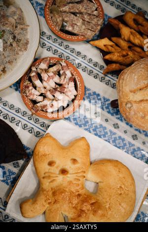 rich village table, pies, sausages, bread. High quality photo Stock Photo