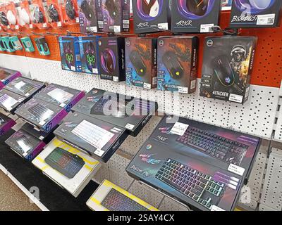 Gaming keyboards and mice display in electronics store Stock Photo - Alamy