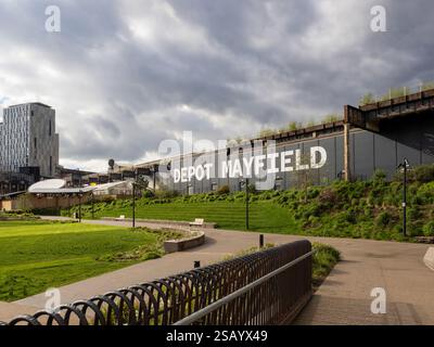 Mayfield Park with a dramatic grey sky looking towards Depot Mayfield,Freight Island and Manchester Marriott Hotel Piccadilly Stock Photo