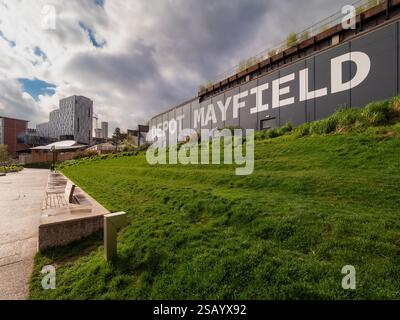 Mayfield Park stepped grass bank with the Depot Mayfield behind.  Manchester UK Stock Photo