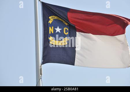 The US state flag of North Carolina waving in the wind Stock Photo - Alamy