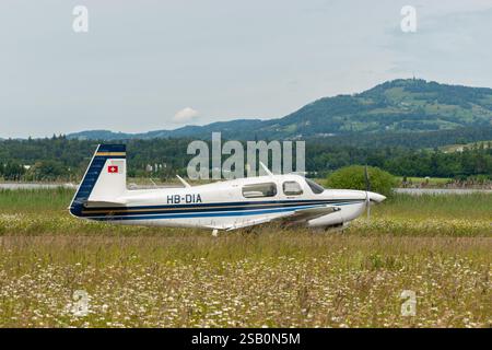 Wangen-Lachen, Switzerland, May 26, 2024 HB-DIA Mooney M20J propeller plane on a small airfield Stock Photo