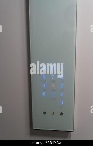 Closeup of glass button panel in an elevator background Stock Photo