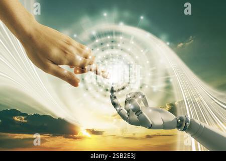 Man and robot touching data network against sunset sky, closeup of hands. Concept of collaboration between AI and human. Modern technology Stock Photo