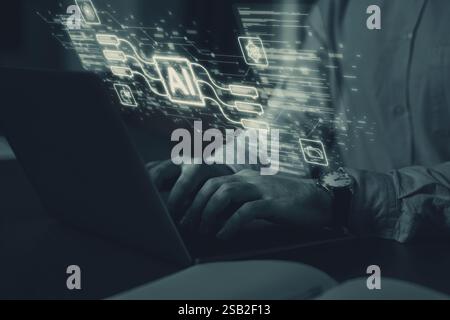 Artificial intelligence. Man using laptop at table, closeup. Scheme with AI and other icons over computer. Toned in grey Stock Photo