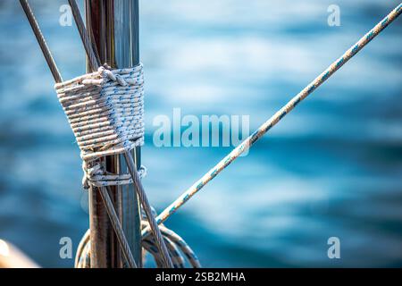 A detailed macro view of a ship’s rope and winch, capturing the ...