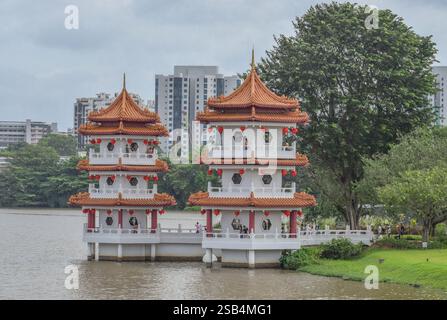 Jurong, Singapore - 30 January 2025: Tourists celebrating Chinese New Year at the twin pagodas near Jurong Lake at Singapore Chinese Garden. Stock Photo