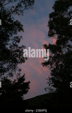 hiking at dusk with cotton colour sky Stock Photo