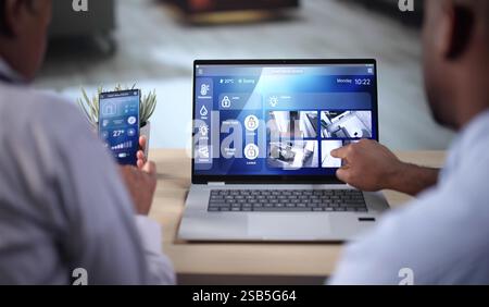 Smart Security System And CCTV Camera On Phone Stock Photo